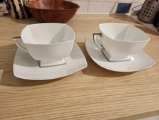 2 tasses et soucoupes en