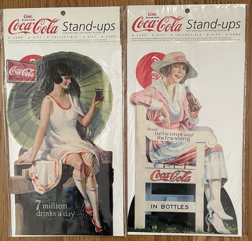 Coca cola umbrella and white - and,