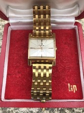 MONRTRE LIP MIDAS PLAQUE OR BRACELLET PLUS RECENT + ETUI LIP