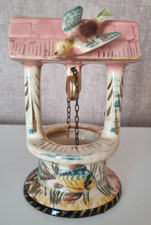 Puits décoratif avec oiseau