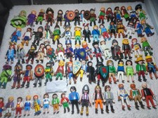 Lot de 75 personnages / figurines Playmobil + accessoires et animaux