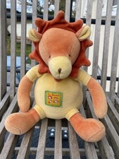 DOUDOU PELUCHE MOULIN ROTY LION MUSICAL LES LOUSTICS JAUNE ORANGE TTBE