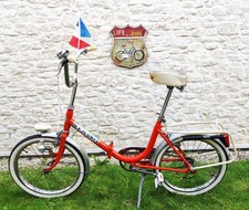 Vélo orange pliant de