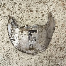 * enjoliveur de garde boue