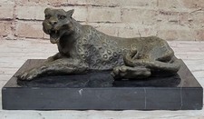 Figurine bronze foncé - en,