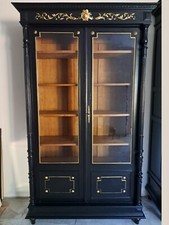 Bibliothèque ancienne patinée noire et or vieilli style Napoléon III.