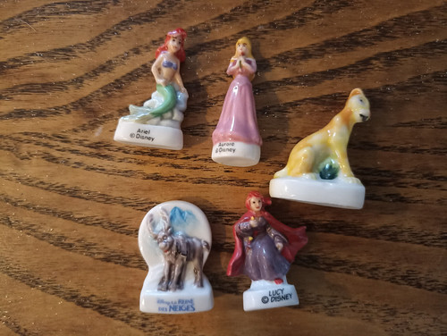 Fève disney lucy reine des - fève,
