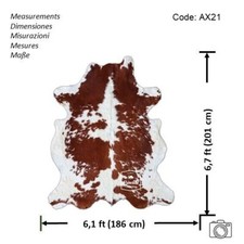 Tapis en cuir de vache marron et blanc cheveux de haute qualité sur la peau...