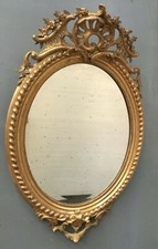 Miroir ovale a fronton en bois