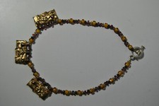 Collier Franck Herval bijou perle fantaisie métal doré décor ange putti