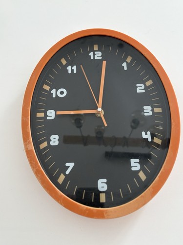 Horloge murale vintage orange