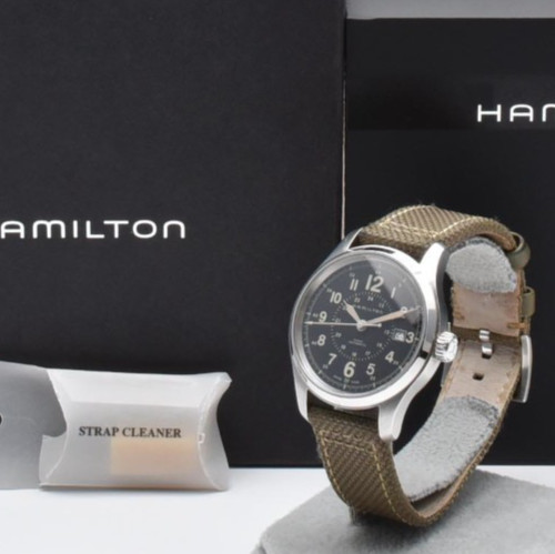 Presque comme neuve montre - [presque,