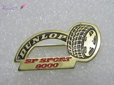 Pin's Les pneus DUNLOP SP SPORT 8000 couleur Doré#B3