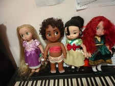 lot 4 poupees disney animators