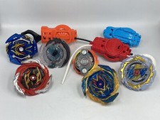 Hasbro BEYBLADE lot 6 Toupies Diverses (Burst Métal Fusion) + 3 Lanceurs