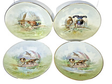 4 Assiettes en porcelaine