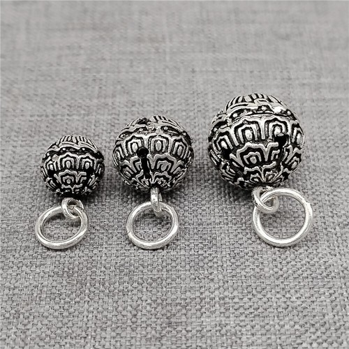 Breloque cloche jingle lotus