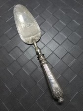 pelle de service en argent