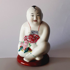 BOUDDHA RIEUR ASSIS