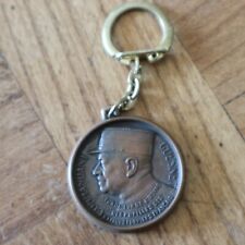 ancien porte cle publicitaire