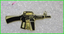 Pin's Arme un fusil