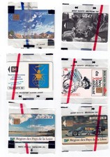 12 télécartes neuves sous