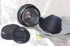 Objectif pour Pentax K 50mm f2 COSINON avec bouchons, pare-soleil et housse TBE
