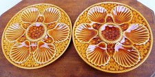 2 assiettes à huîtres barbotine de LONGCHAMP couleur miel, TBE