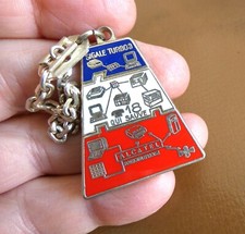 Ancien porte cle ALCATEL Sigale Turbo 18 qui sauve Radiotéléphone. métal émail.