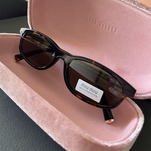 Lunettes soleil miu - de,