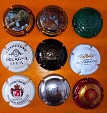 B19) Un lot de 9 capsules de