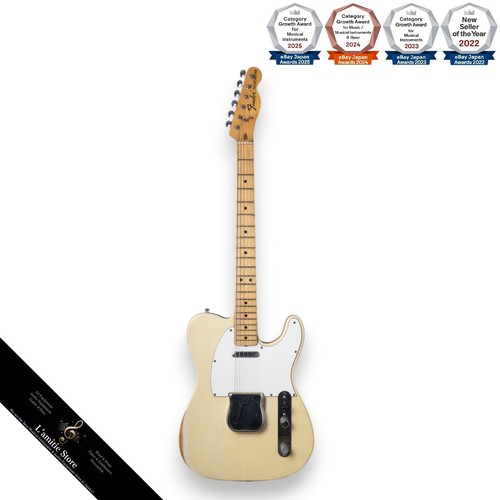 Guitare électrique blonde