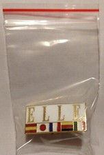 PIN'S ELLE (REVUE) - SIGNÉ