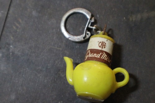 Ancien porte cle publicitaire - porte,