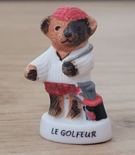 Fève - Ours - le golfeur   ......   (Ref. 7719)