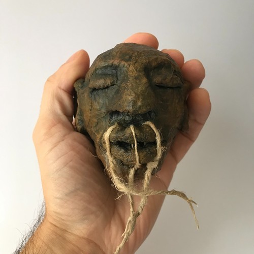 Reproduction tête réduite - de,