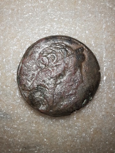 Monnaie romaine identifie - a,