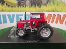 UH6765 - MASSEY-FERGUSON 575 cabine rouge 4 roues motrices jumelé - Universal...