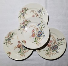 Lot de 4 assiettes plates en faïence de Luneville modèle Bleuet, terre de fer