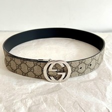 Ceinture Gucci en toile GG et cuir noir avec boucle GG enlacés en métal argenté