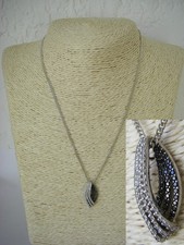 collier pendentif serti