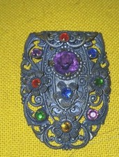 Broche ancienne à clip en métal blanc serti de strass, occasion
