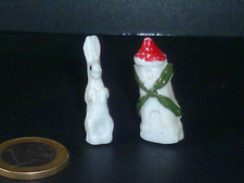 2 FÈVES ANCIENNES PORCELAINE LAPIN ET MOULIN À VENT
