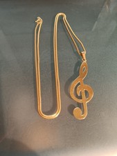 Collier + clé de sol -  or