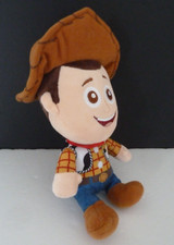 O9. DOUDOU PELUCHE WOODY ANDY TOYS STORY DISNEY PIXAR 19cm assis TTBE *