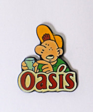 RNT M/ Pin's boisson OASIS dessin Margerin