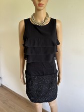 Robe noire et pailletée sans