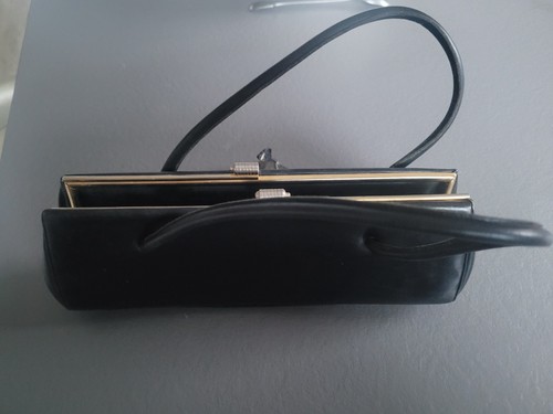 Petit sac main cuir des - en,