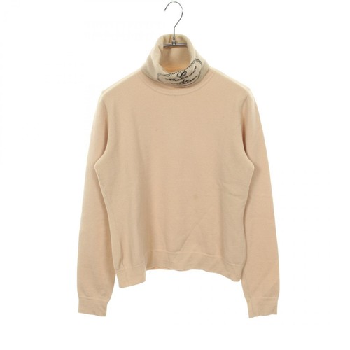 Pull tricoté col roulé