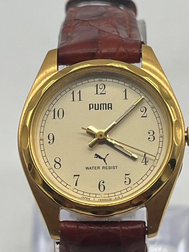 Montre puma vintage dorée - vintage,